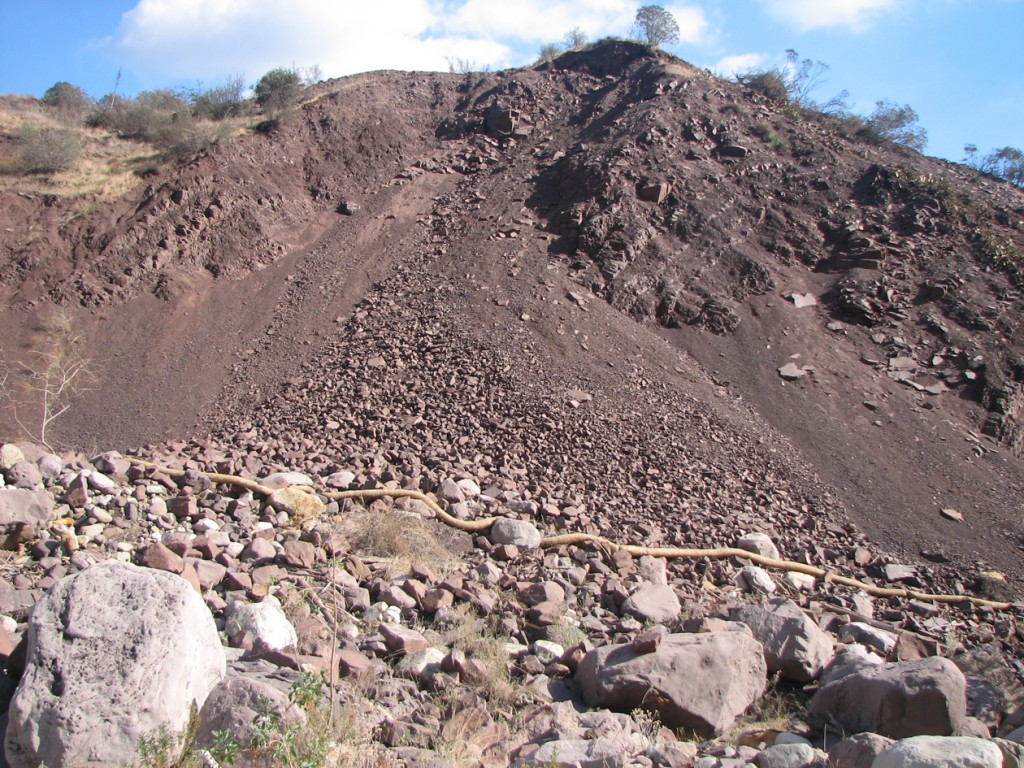 Rocks and debris falling into Sespe Creek from unpermitted road construction above.