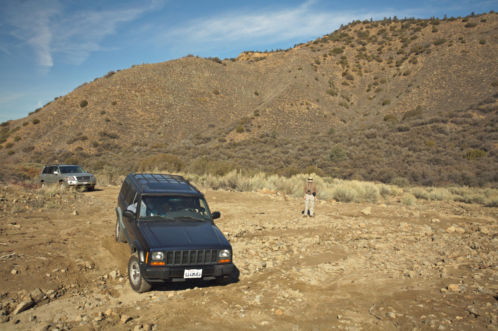 Fording a dry creekbed on our way to clean up microtrash on Cuyama Peak